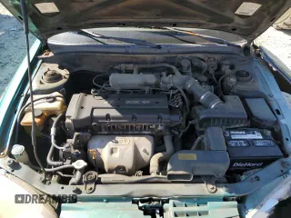 2000 Hyundai Elantra GLS z VIN KMHJF35FXYU998689, wystawiony jako Copart lot #76181814 z przebiegiem 154 743 mil mil oraz Szkoda całkowita • Salvage title. Historia ofert i sprzedaży dostępna na DreamBid. Obrazek 11.