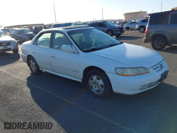 2002 Honda Accord EX z VIN 1HGCG16522A024557, wystawiony jako IAAI lot #41525344 z przebiegiem 219 786 mil mil oraz . Historia ofert i sprzedaży dostępna na DreamBid. Obrazek 1.