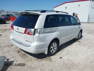2006 Toyota Sienna XLE with VIN 5TDZA22C06S576958, listed as a IAAI auction lot 41978892 with 257,598 mi miles. Bid and sale history available at carsss.com. Image 4.