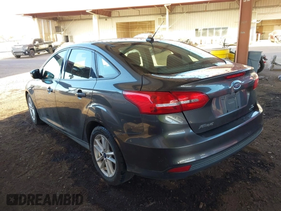 2016 Ford Focus SE with VIN 1FADP3F28GL330815, listed as a IAAI auction lot 41696821 with 125,247 mi miles. Bid and sale history available at carsss.com. Image 3.