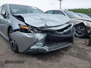 2018 Toyota Camry LE z VIN 4T1B11HK3JU129549, wystawiony jako IAAI lot #42159243 z przebiegiem 76 299 mil mil oraz . Historia ofert i sprzedaży dostępna na DreamBid. Obrazek 18.
