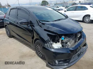 2017 Honda Fit LX with VIN JHMGK5H51HS012176, listed as a IAAI auction lot 42011477 with 91,894 mi miles. Bid and sale history available at carsss.com. Image 1.