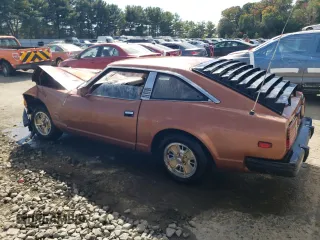 1981 Datsun 280ZX 2+2 z VIN JN1HZ06S6BX193317, wystawiony jako Copart lot #75494384 z przebiegiem 78 678 mil mil oraz Szkody całkowita. Historia ofert i sprzedaży dostępna na DreamBid. Obrazek 2.