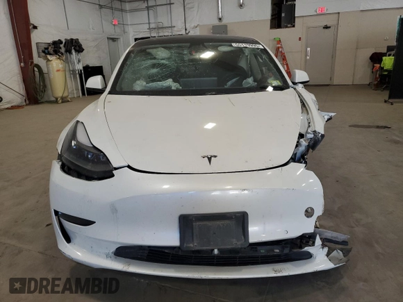 2021 Tesla Model 3 Standard Range Plus z VIN 5YJ3E1EA7MF986964, wystawiony jako Copart lot #55119995 z przebiegiem Nie podano mil oraz Szkody całkowita. Historia ofert i sprzedaży dostępna na DreamBid. Obrazek 5.