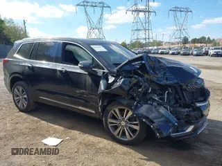2020 Cadillac XT6 AWD Premium Luxury with VIN 1GYKPDRS0LZ101498, listed as a IAAI auction lot 40506360 with 46,920 mi miles and . Bid and sale history available at DreamBid. Image 1.