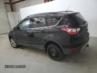 2018 Ford Escape SE z VIN 1FMCU9GD9JUD21474, wystawiony jako Copart lot #53921535 z przebiegiem 136 819 mil mil oraz Czysty tytuł • Clean title. Historia ofert i sprzedaży dostępna na DreamBid. Obrazek 2.