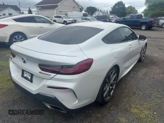 2019 BMW 8 Series M850i xDrive z VIN WBABC4C57KBJ35771, wystawiony jako Copart lot #59172615 z przebiegiem 68 270 mil mil oraz Tytuł czysty. Historia ofert i sprzedaży dostępna na DreamBid. Obrazek 3.