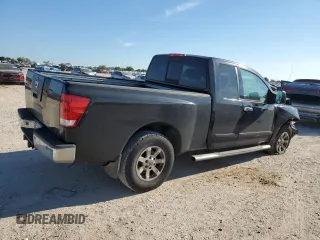 2006 Nissan Titan SE with VIN 1N6BA06B96N521452, listed as a Copart auction lot 70101084 with 197,101 mi miles and Salvage Title. Bid and sale history available at DreamBid. Image 3.