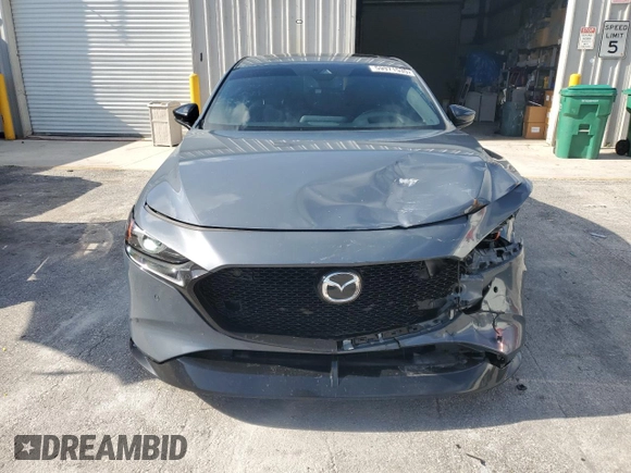 2021 Mazda 3 Premium Plus with VIN JM1BPBNYXM1403126, listed as a Copart auction lot 59971535 with 56,952 mi miles and Salvage title. Bid and sale history available at DreamBid. Image 5.
