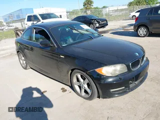 2011 BMW 1 Series 128i with VIN WBAUP7C53BVK79038, listed as a IAAI auction lot 41839979 with 201,893 mi miles. Bid and sale history available at carsss.com. Image 1.
