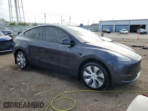 2024 Tesla Model Y Long Range with VIN 7SAYGDEE3RA256304, listed as a Copart auction lot 56160535 with 20,224 mi miles and Salvage title. Bid and sale history available at DreamBid. Image 4.