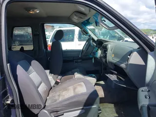 2003 Ford Explorer Sport XLS с VIN 1FMYU60E43UB15814, выставлен на аукционе IAAI как лот 42398772 с пробегом 266 486 миль миль и . История ставок и продаж доступна на DreamBid. Изображение 5.