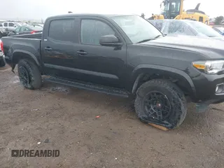 2017 Toyota Tacoma SR5 with VIN 5TFAZ5CN2HX040954, listed as a IAAI auction lot 41733137 with 97,780 mi miles and . Bid and sale history available at DreamBid. Image 6.