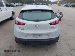 2016 Mazda CX-3 Grand Touring with VIN JM1DKFD7XG0132084, listed as a IAAI auction lot 41004954 with 70,476 mi miles. Bid and sale history available at carsss.com. Image 16.