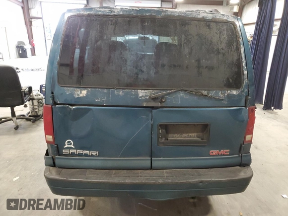 2000 GMC Safari z VIN 1GKDM19W3YB542183, wystawiony jako Copart lot #41561145 z przebiegiem 328 252 mil mil oraz Szkody całkowita. Historia ofert i sprzedaży dostępna na DreamBid. Obrazek 6.