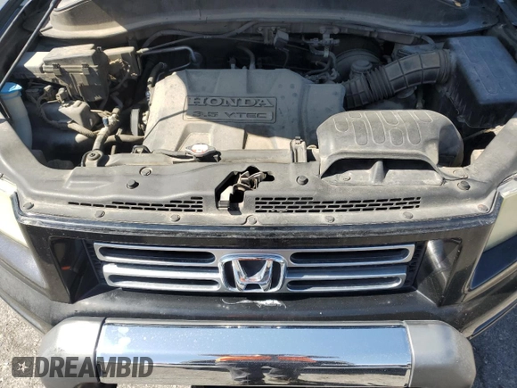 2006 Honda Ridgeline RTL z VIN 2HJYK16586H545773, wystawiony jako Copart lot #58658325 z przebiegiem 166 355 mil mil oraz Czysty tytuł • Clean title. Historia ofert i sprzedaży dostępna na DreamBid. Obrazek 11.