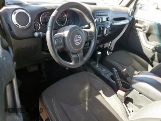 2017 Jeep Wrangler Unlimited Sahara with VIN 1C4BJWEG3HL665774, listed as a Copart auction lot 48538105 with 98,676 mi miles and Salvage Title. Bid and sale history available at carsss.com. Image 8.