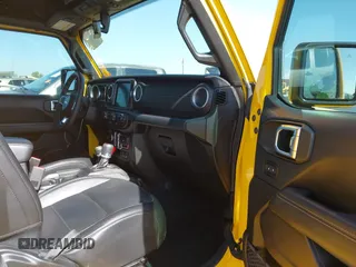 2018 Jeep Wrangler Unlimited Sahara z VIN 1C4HJXEN3JW306282, wystawiony jako IAAI lot #42302821 z przebiegiem 70 204 mil mil oraz . Historia ofert i sprzedaży dostępna na DreamBid. Obrazek 5.