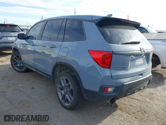 2023 Honda Passport EX-L with VIN 5FNYF8H52PB027082, listed as a IAAI auction lot 41788783 with 32,186 mi miles and . Bid and sale history available at carsss.com. Image 3.