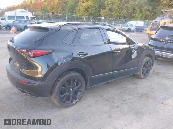 2023 Mazda CX-30 2.5 S Premium Package with VIN 3MVDMBDM5PM536219, listed as a IAAI auction lot 40710444 with 16,863 mi miles. Bid and sale history available at carsss.com. Image 4.