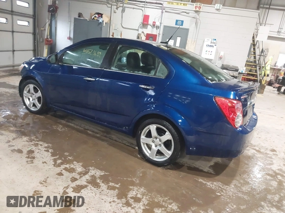 2014 Chevrolet Sonic LTZ with VIN 1G1JE5SB5E4226187, listed as a IAAI auction lot 41521689 with 73,325 mi miles. Bid and sale history available at carsss.com. Image 3.