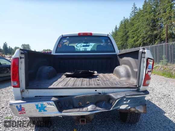 2005 Dodge 2500 SLT z VIN 3D7KS28CX5G853026, wystawiony jako IAAI lot #42408623 z przebiegiem 241 223 mil mil oraz . Historia ofert i sprzedaży dostępna na DreamBid. Obrazek 17.
