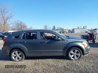 2012 Dodge Caliber SXT z VIN 1C3CDWDA6CD506571, wystawiony jako IAAI lot #41845451 z przebiegiem 99 496 mil mil oraz . Historia ofert i sprzedaży dostępna na DreamBid. Obrazek 13.