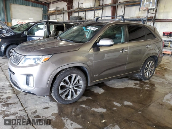 2015 Kia Sorento SX z VIN 5XYKWDA77FG614704, wystawiony jako Copart lot #59217985 z przebiegiem 200 675 mil mil oraz Czysty tytuł • Clean title. Historia ofert i sprzedaży dostępna na DreamBid. Obrazek 1.