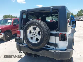 2013 Jeep Wrangler Sport with VIN 1C4AJWAG0DL542624, listed as a IAAI auction lot 42590160 with 54,850 mi miles and . Bid and sale history available at DreamBid. Image 6.