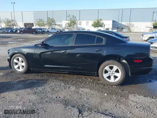 2014 Dodge Charger SE with VIN 2C3CDXBGXEH353860, listed as a IAAI auction lot 41819065 with 158,774 mi miles. Bid and sale history available at carsss.com. Image 13.