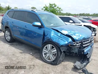 2019 Volkswagen Atlas SE z VIN 1V2WR2CA5KC524650, wystawiony jako IAAI lot #42217791 z przebiegiem 92 571 mil mil oraz . Historia ofert i sprzedaży dostępna na DreamBid. Obrazek 1.