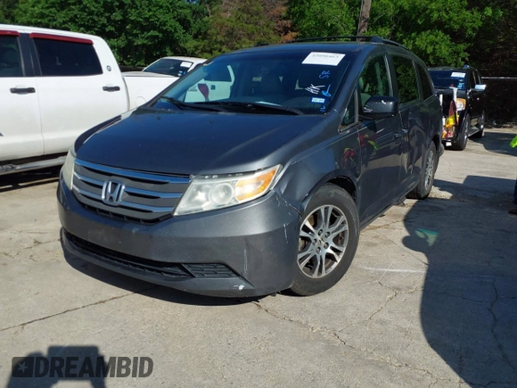 2011 Honda Odyssey EX-L with VIN 5FNRL5H6XBB073482, listed as a IAAI auction lot 42090463 with 213,061 mi miles and . Bid and sale history available at carsss.com. Image 17.