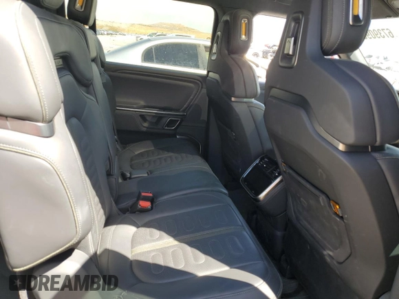 2023 Rivian R1S Launch Edition z VIN 7PDSGABLXPN004161, wystawiony jako Copart lot #67390954 z przebiegiem Nie podano mil oraz Szkody całkowita. Historia ofert i sprzedaży dostępna na DreamBid. Obrazek 10.