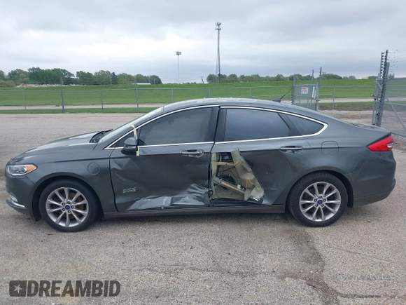 2017 Ford Fusion Energi SE with VIN 3FA6P0PU9HR227932, listed as a IAAI auction lot 42177500 with 106,938 mi miles. Bid and sale history available at carsss.com. Image 14.