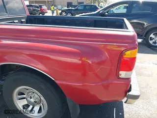 1999 Ford Ranger XL with VIN 1FTYR14V4XPA19852, listed as a IAAI auction lot 41837498 with 159,521 mi miles. Bid and sale history available at carsss.com. Image 19.