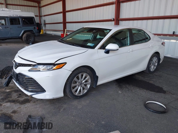 2020 Toyota Camry LE with VIN 4T1C11AK9LU935025, listed as a IAAI auction lot 42054033 with 63,814 mi miles and . Bid and sale history available at carsss.com. Image 17.