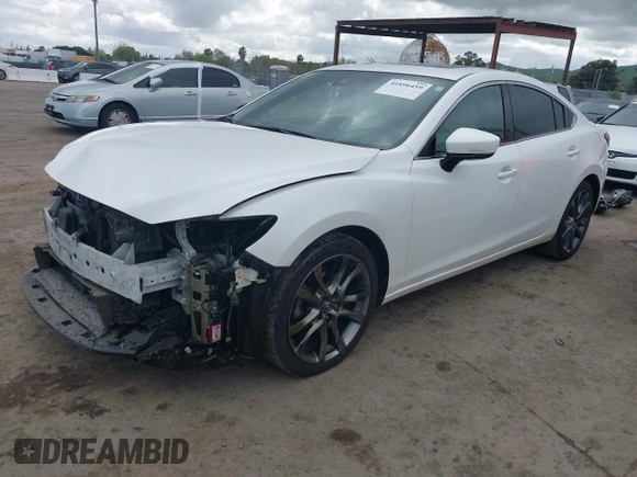2017 Mazda 6 Grand Touring with VIN JM1GL1X57H1118646, listed as a IAAI auction lot 41896459 with 105,768 mi miles and . Bid and sale history available at carsss.com. Image 2.