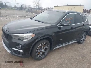 2016 BMW X1 xDrive28i with VIN WBXHT3C37G5E48434, listed as a IAAI auction lot 42005591 with 140,066 mi miles and . Bid and sale history available at DreamBid. Image 2.