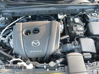 2024 Mazda CX-50 S Premium Plus z VIN 7MMVABEM5RN209065, wystawiony jako IAAI lot #41525183 z przebiegiem 12 297 mil mil oraz . Historia ofert i sprzedaży dostępna na DreamBid. Obrazek 10.