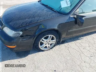 1998 Acura CL z VIN 19UYA3245WL000750, wystawiony jako IAAI lot #41987675 z przebiegiem 212 914 mil mil oraz . Historia ofert i sprzedaży dostępna na DreamBid. Obrazek 6.