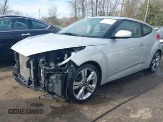 2017 Hyundai Veloster with VIN KMHTC6AD2HU324740, listed as a IAAI auction lot 41574415 with 66,685 mi miles. Bid and sale history available at carsss.com. Image 18.