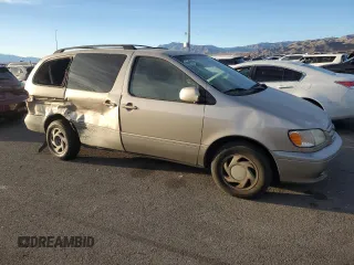 2002 Toyota Sienna LE with VIN 4T3ZF13C12U486009, listed as a Copart auction lot 87877695 with 250,778 mi miles and Salvage Title. Bid and sale history available at carsss.com. Image 4.