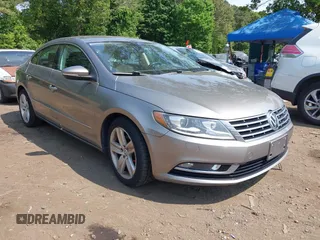 2013 Volkswagen CC Sport Plus z VIN WVWBP7AN0DE557815, wystawiony jako IAAI lot #42439911 z przebiegiem 121 247 mil mil oraz . Historia ofert i sprzedaży dostępna na DreamBid. Obrazek 1.
