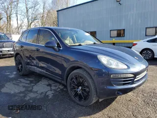 2012 Porsche Cayenne with VIN WP1AA2A20CLA02006, listed as a Copart auction lot 49129885 with 143,605 mi miles and Salvage title. Bid and sale history available at DreamBid. Image 4.