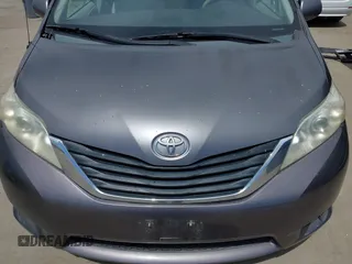2011 Toyota Sienna LE AAS with VIN 5TDKK3DC8BS073125, listed as a IAAI auction lot 42018649 with 199,595 mi miles. Bid and sale history available at carsss.com. Image 6.