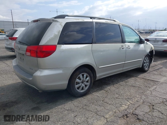 2004 Toyota Sienna CE with VIN 5TDZA23C04S032956, listed as a IAAI auction lot 42121153 with 218,908 mi miles. Bid and sale history available at carsss.com. Image 4.
