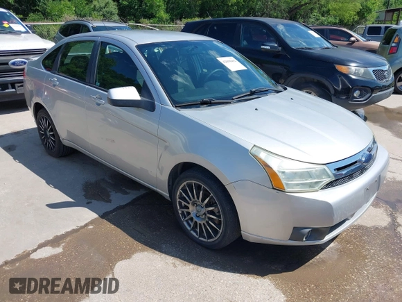 2009 Ford Focus SES with VIN 1FAHP36N69W102910, listed as a IAAI auction lot 42098402 with 149,957 mi miles. Bid and sale history available at carsss.com. Image 1.