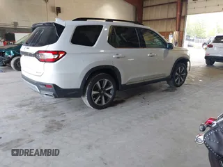 2023 Honda Pilot Elite with VIN 5FNYG1H85PB055926, listed as a IAAI auction lot 40416361 with 16,121 mi miles. Bid and sale history available at carsss.com. Image 4.
