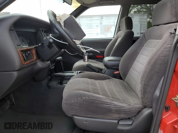 1997 Jeep Grand Cherokee Laredo with VIN 1J4GZ58S3VC739922, listed as a Copart auction lot 55667885 with 209,075 mi miles and Salvage title. Bid and sale history available at DreamBid. Image 7.