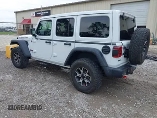 2021 Jeep Wrangler Unlimited Rubicon with VIN 1C4JJXFM9MW774142, listed as a IAAI auction lot 42625007 with 42,318 mi miles and . Bid and sale history available at DreamBid. Image 3.